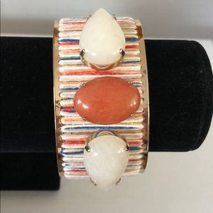 Chico’s multi color thread bracelet on gold.